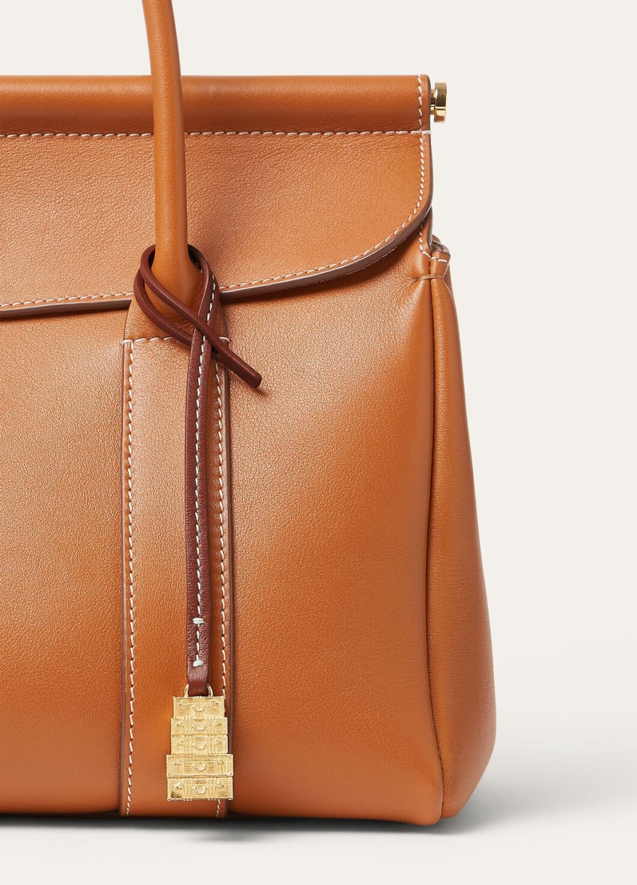 charm koffer van kalfsleer in de kleur deep kummelsun gold
