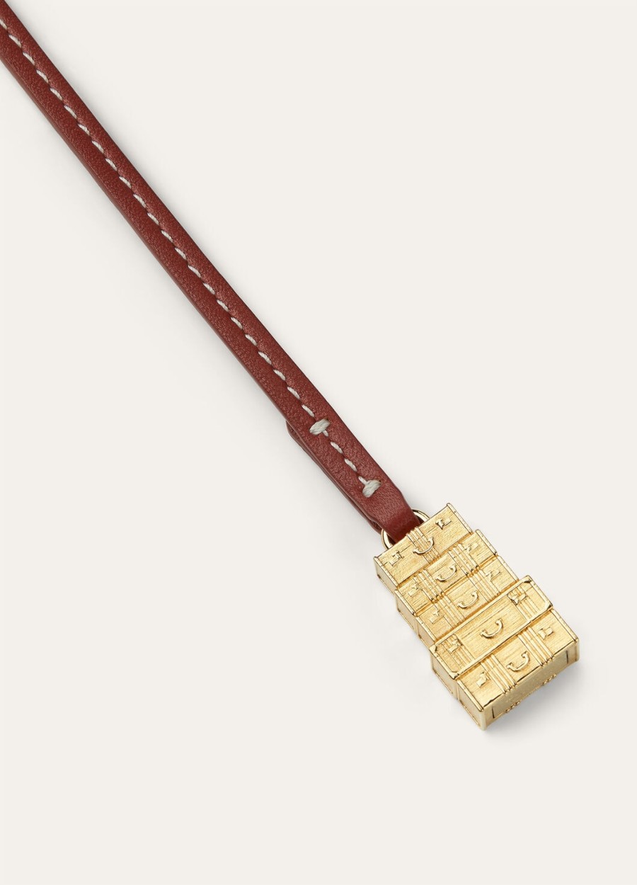 charm koffer van kalfsleer in de kleur deep kummelsun gold