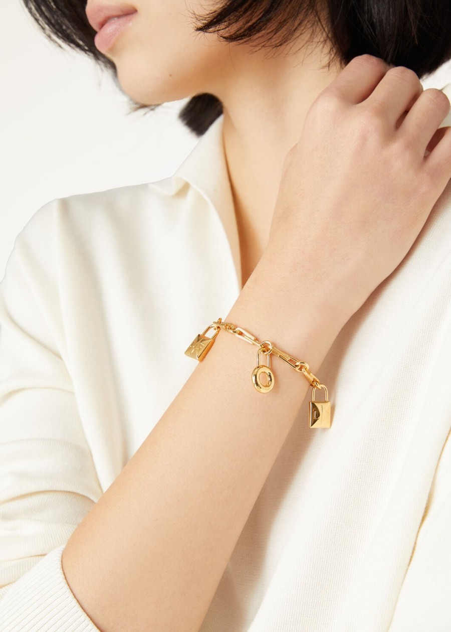 mijn bedeltjes armband met messing edelsteen en zonmotief in goudkleur