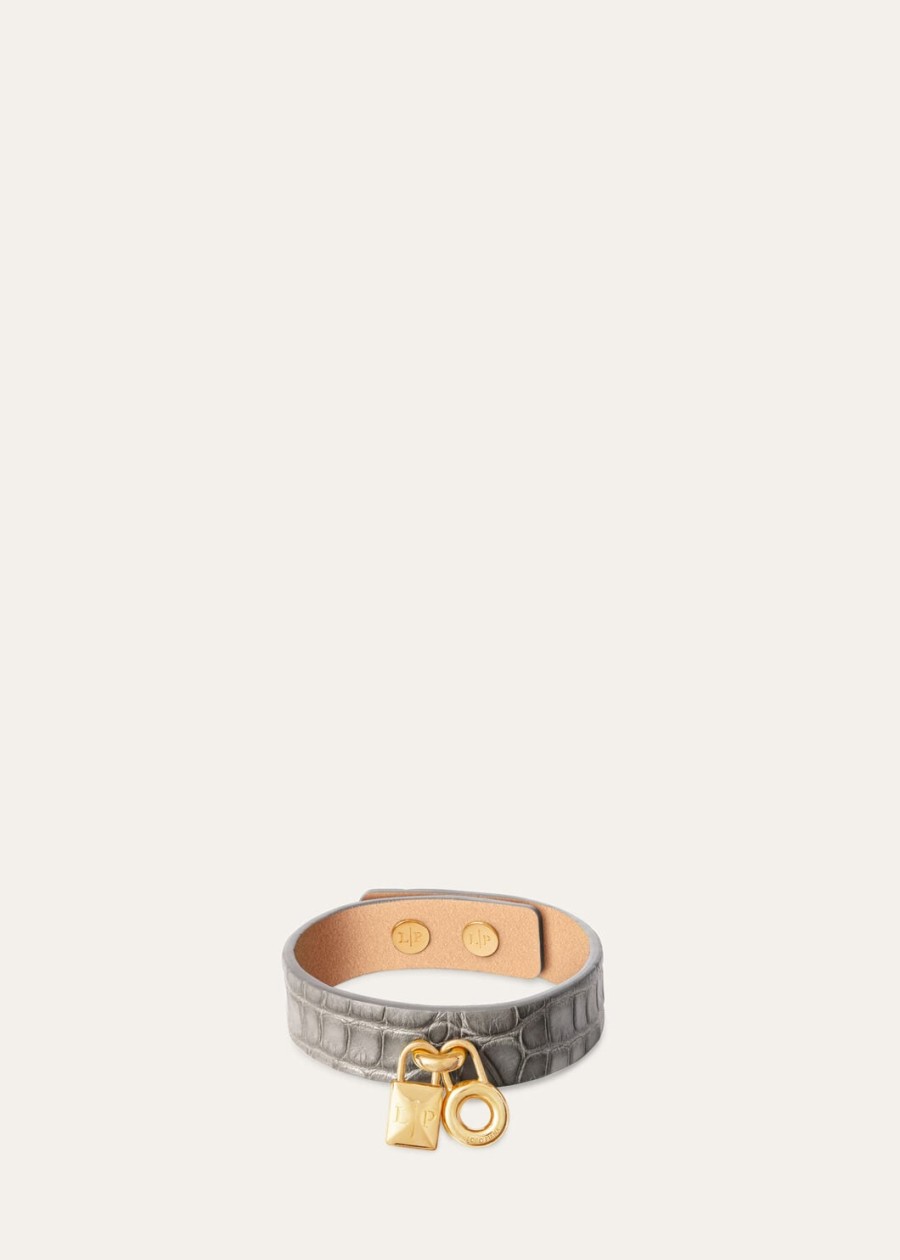 extra bandje van alligatorleer in de kleuren puddle greyjewel sun gold