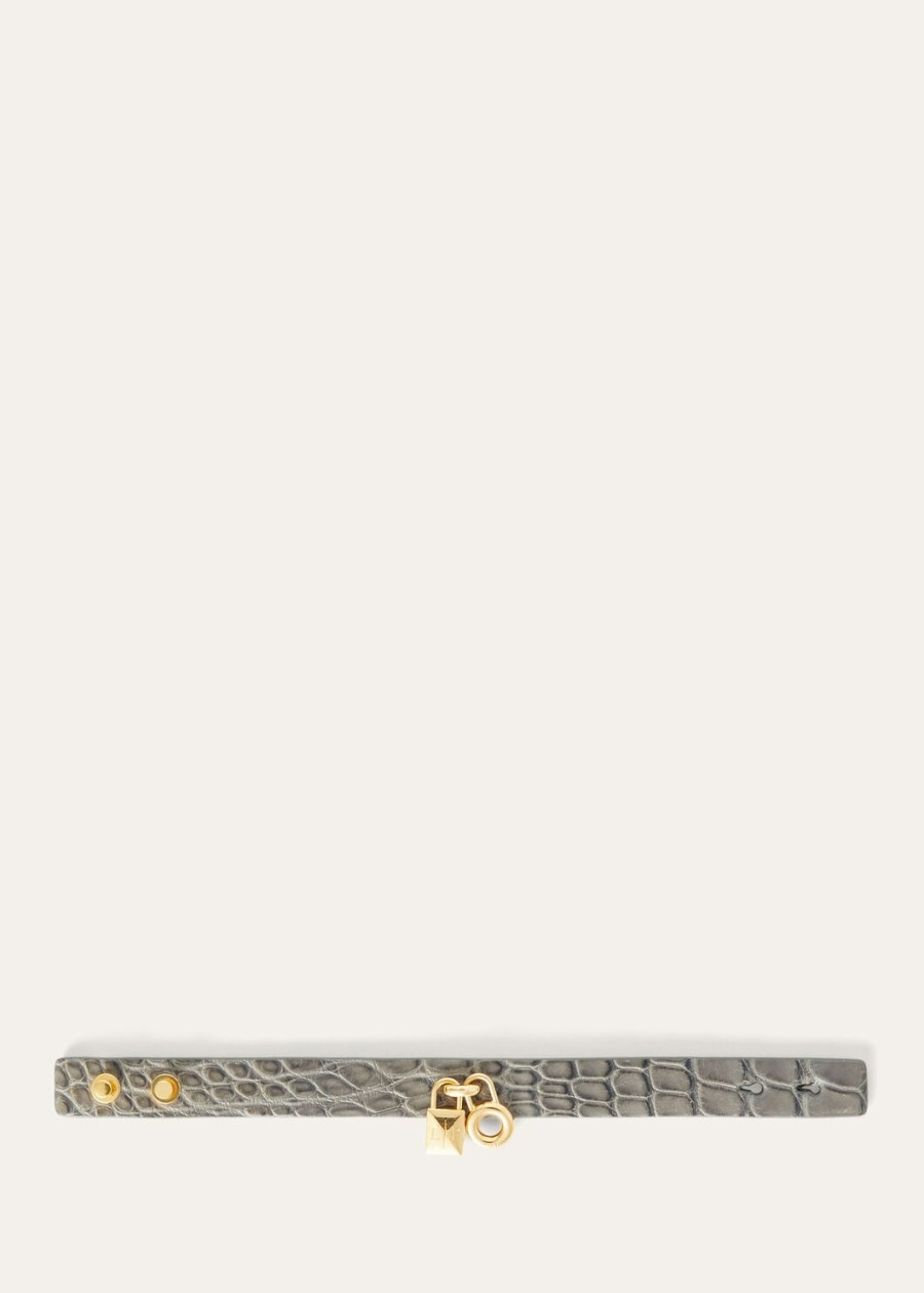 extra bandje van alligatorleer in de kleuren puddle greyjewel sun gold