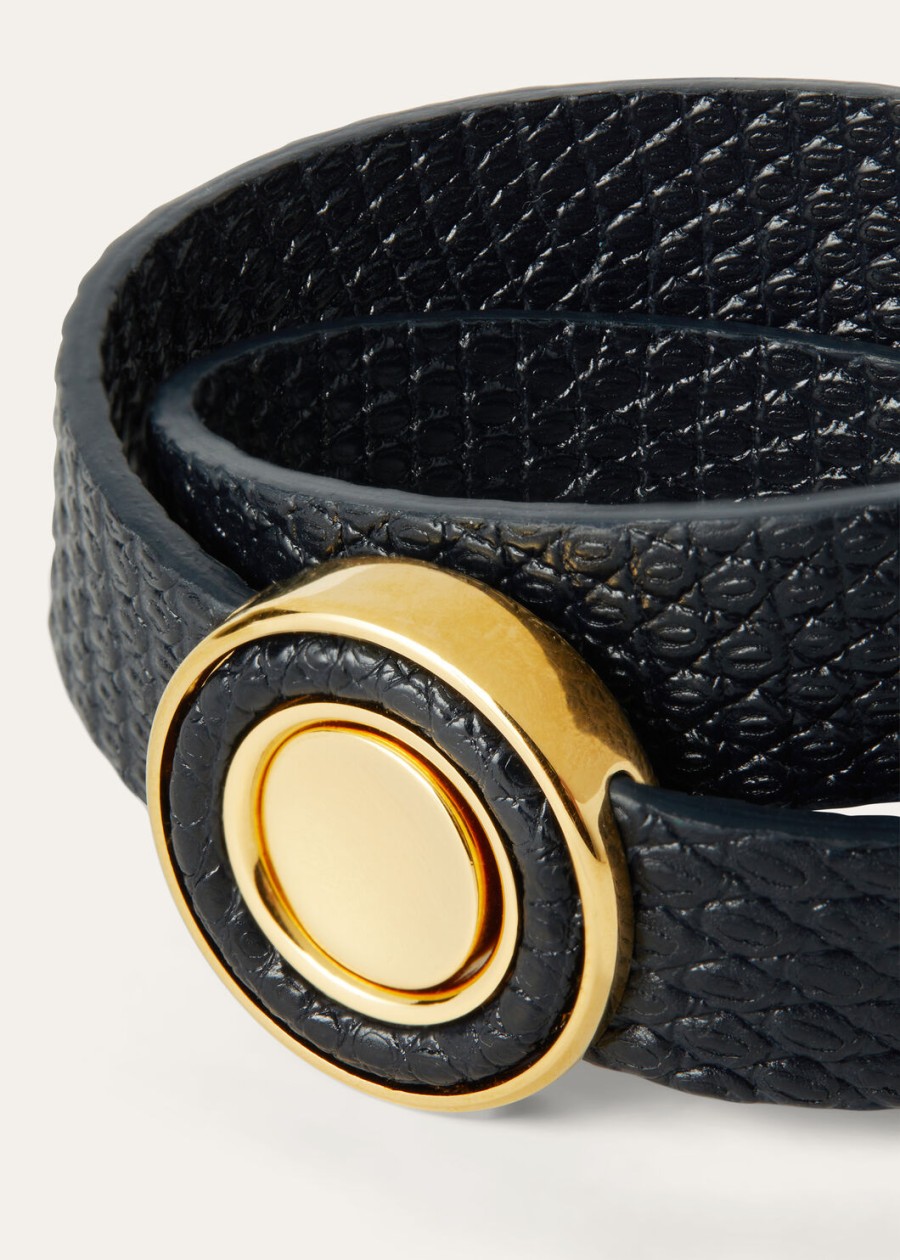 marineblauwe armband met hangertjes van hagedissenleer gouden zon sieraden