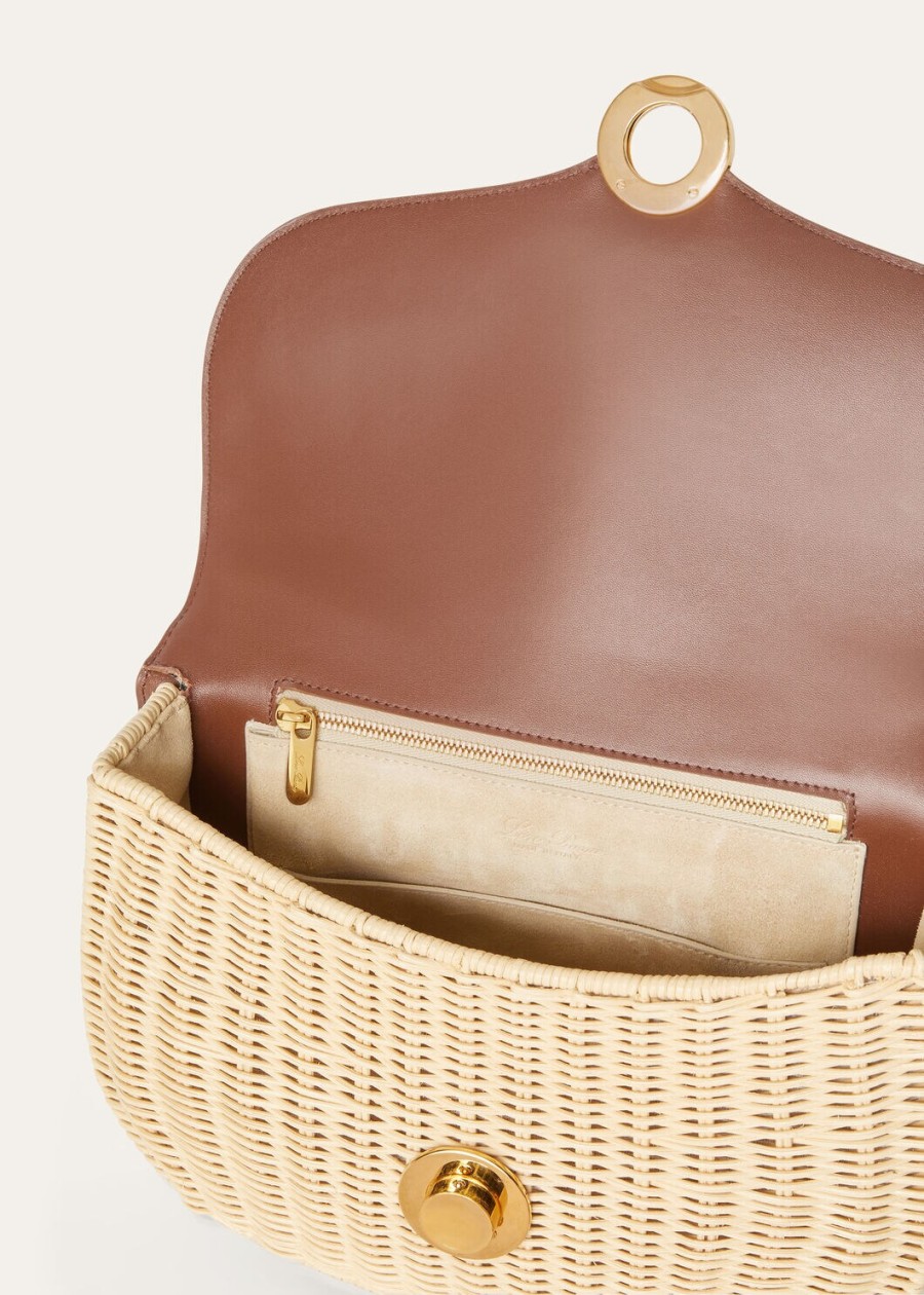 middelgrote rieten tas met ring van moutschors.