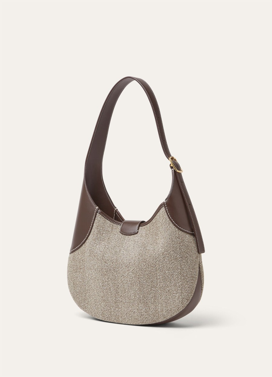 middelgrote tas van zuivere scheerwol naturel bruindonkere chocoladezoethoutzonnegoud