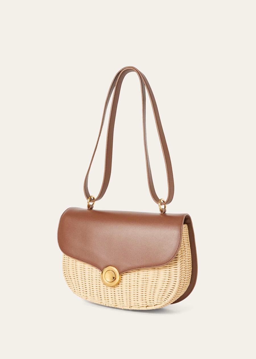 Middelgrote rieten tas met ring van mout/schors.