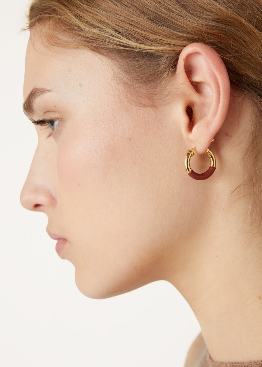 duo hoop oorbellen van messing diep kummelsun sieraden goudkleurig.