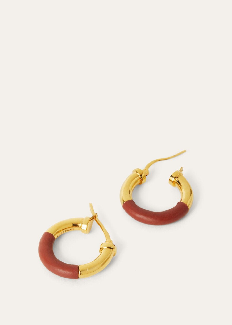duo hoop oorbellen van messing diep kummelsun sieraden goudkleurig.