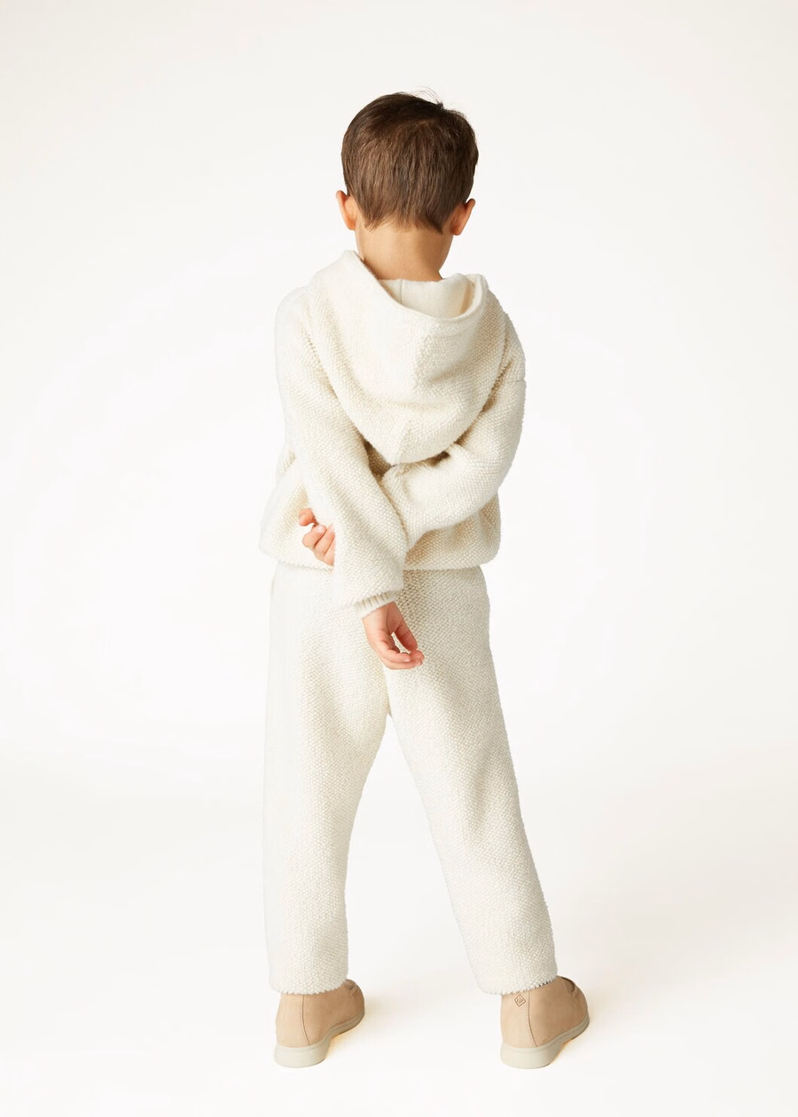 Kinderbroek van kasjmier met nougatprint en krullend effect