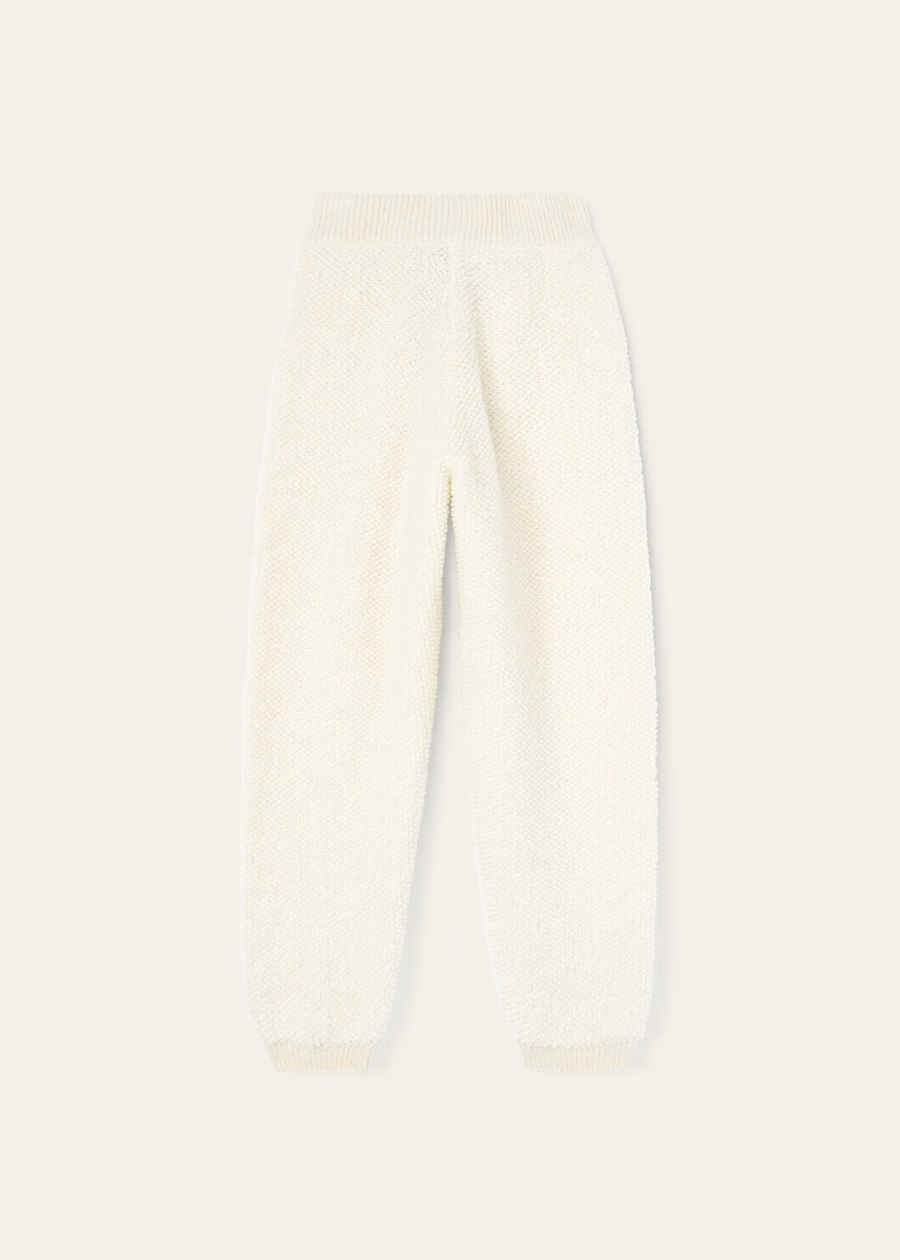 Kinderbroek van kasjmier met nougatprint en krullend effect