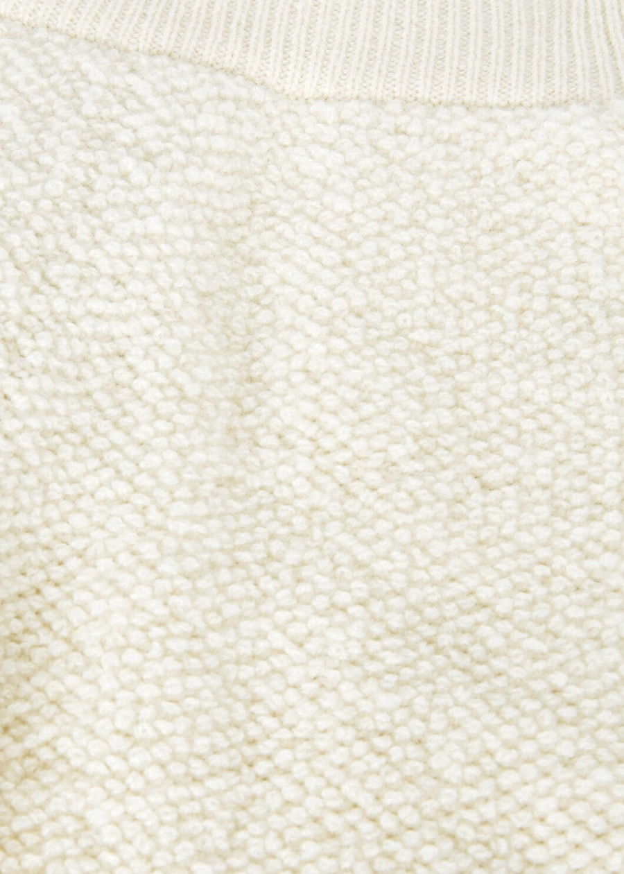 Kinderbroek van kasjmier met nougatprint en krullend effect