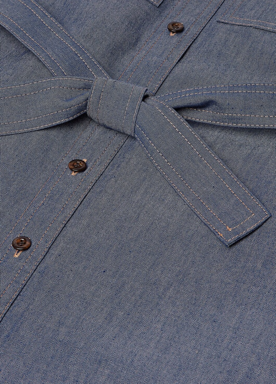 Corinna jurk voor kinderen van katoen, kasjmier en chambray in blauw.