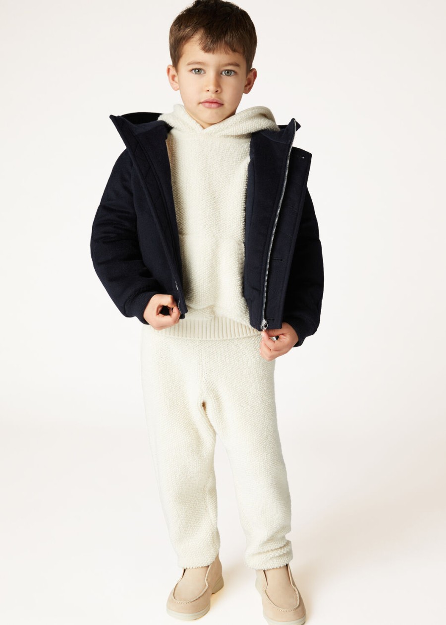kinderbroek van kasjmier met nougatprint en krullend effect