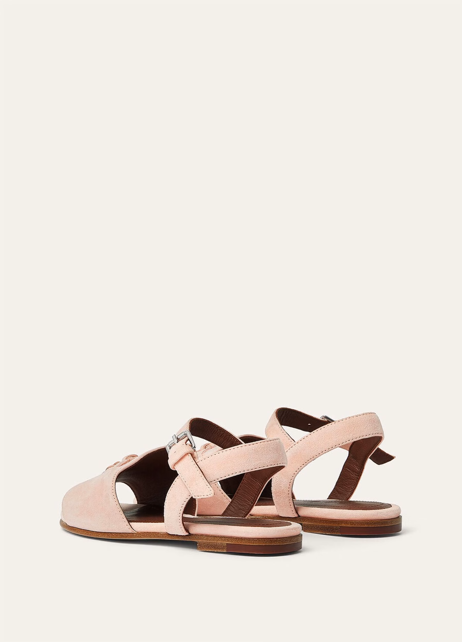 Bedeltjes voor kinderen: roze sandalen van geitenleer met schelpmotief.