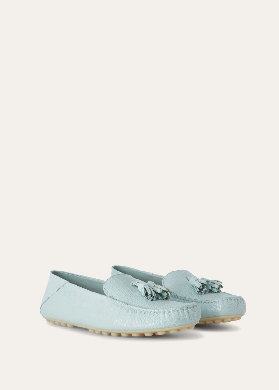 mocassins van hagedissenleer met stippenzool in de kleur azuurblauw en saffier.
