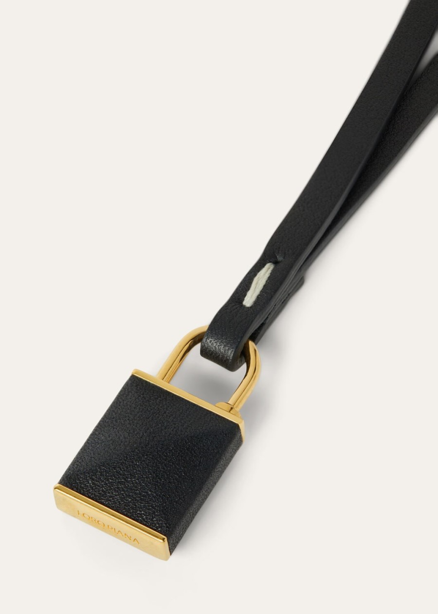 extra hangslotketting van zwart kalfsleer met gouden zon-sieraden