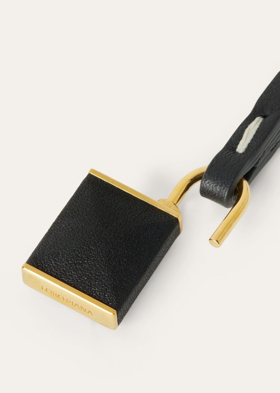 extra hangslotketting van zwart kalfsleer met gouden zon-sieraden