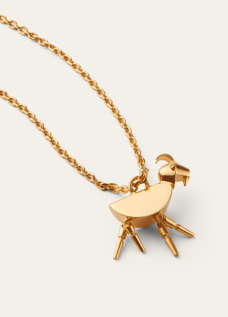 Geitenketting van messing met zonmotief, gouden sieraden