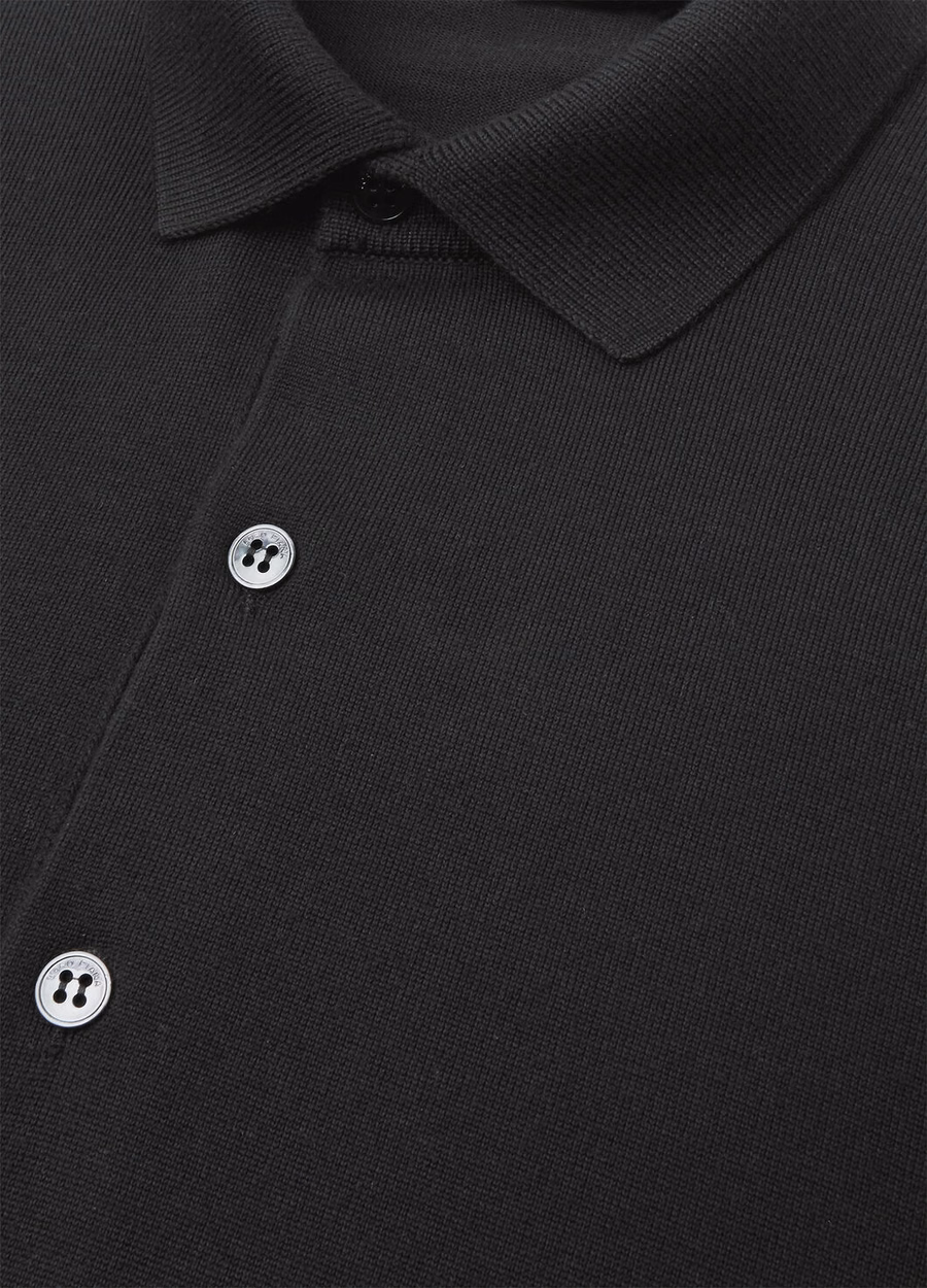 Het zwarte poloshirt van The Gift of Kings®