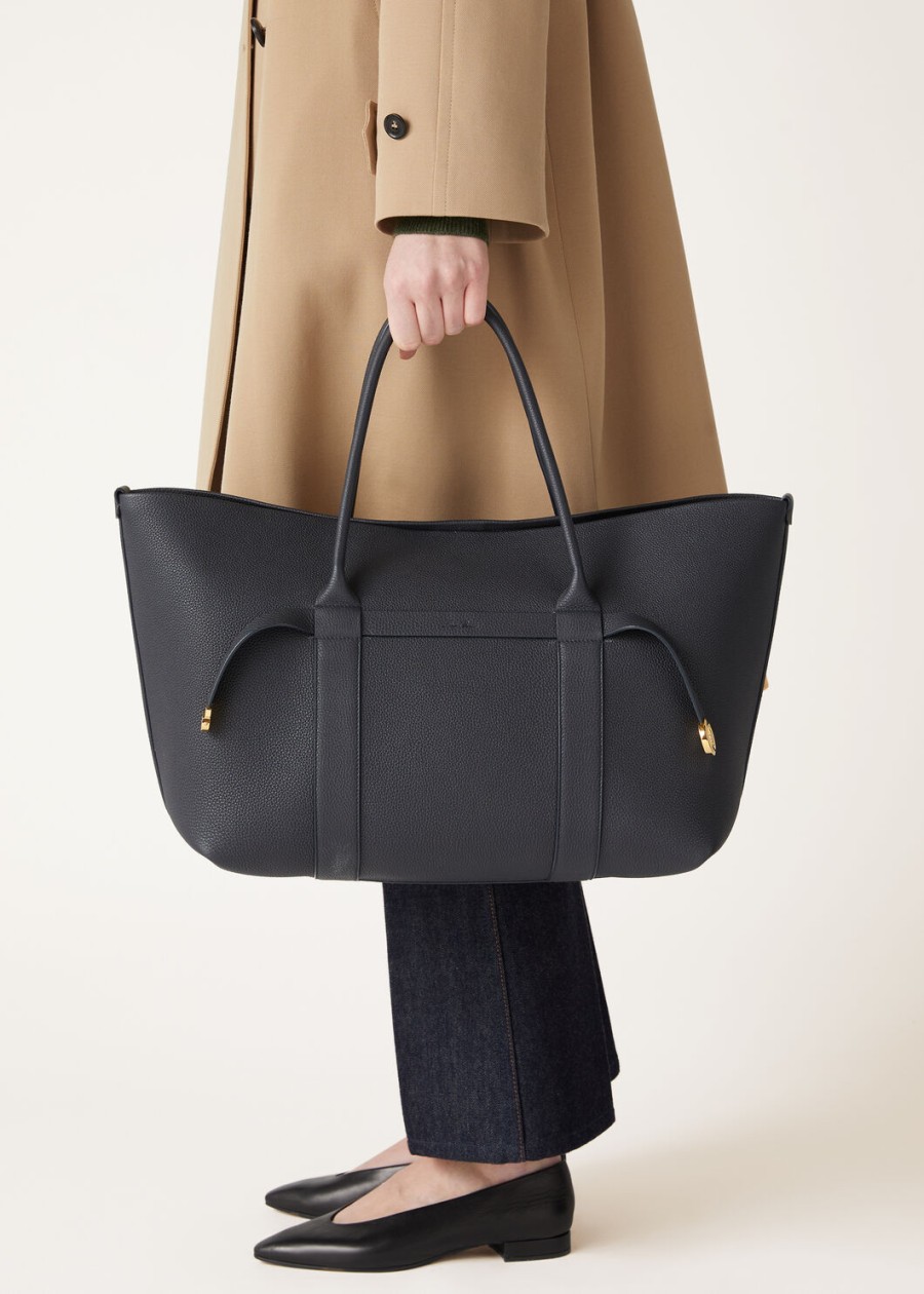 grote shopper ring van kalfsleer in de kleuren blauw marineblauwzonnegoud.