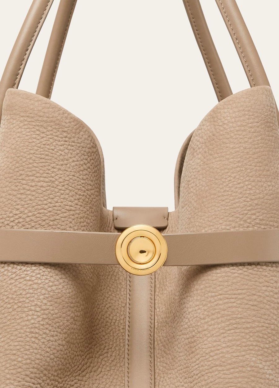 Grote shopper ring van kalfsleer in de kleuren fuchsia taupe/zonnegoud.