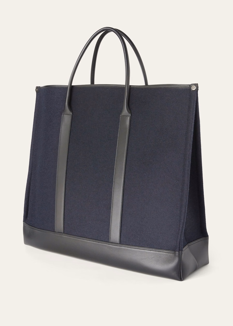 Grote kasjmier crossbodytas in marineblauw/zwart/antracietgrijs.