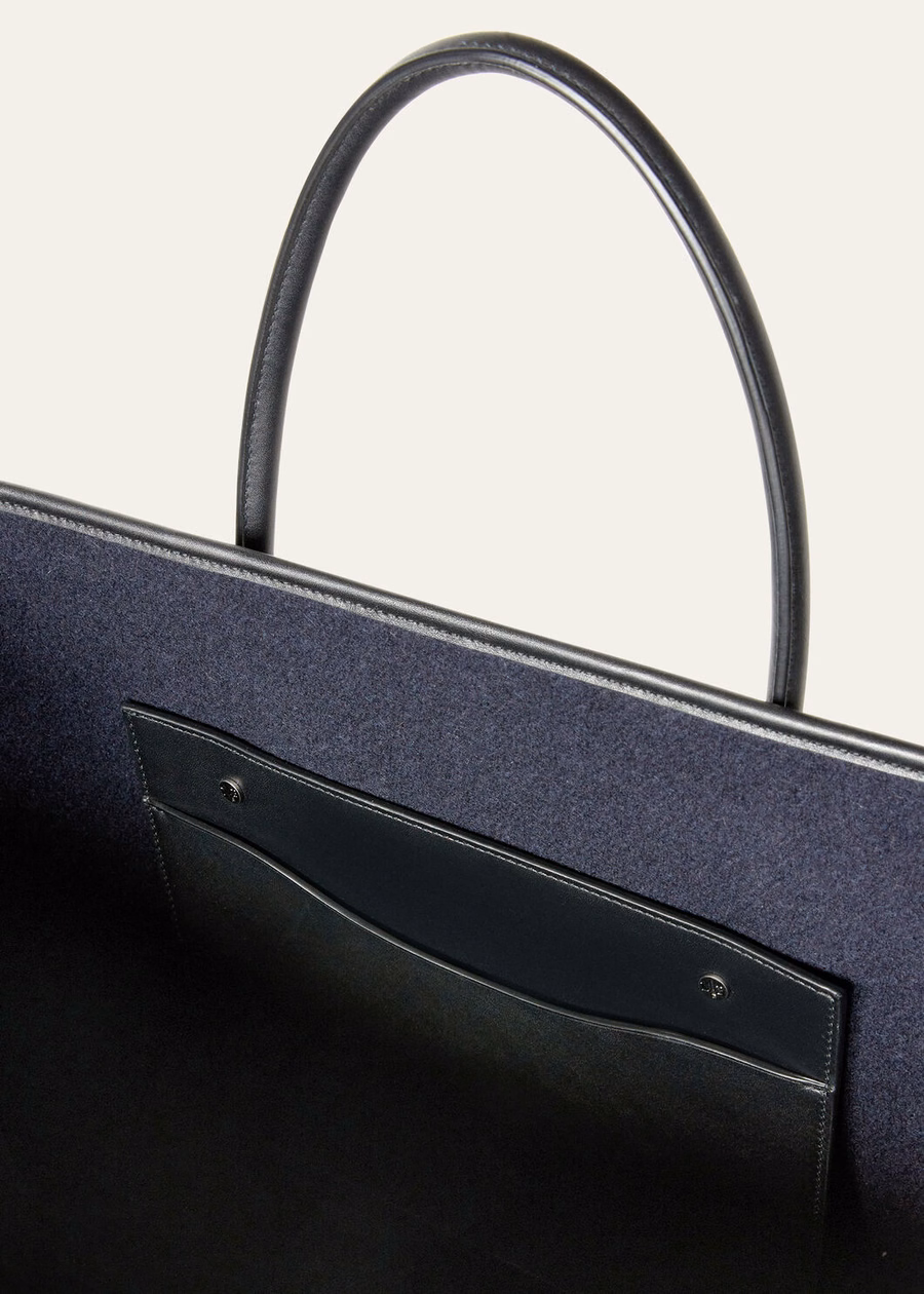 Grote kasjmier crossbodytas in marineblauw/zwart/antracietgrijs.